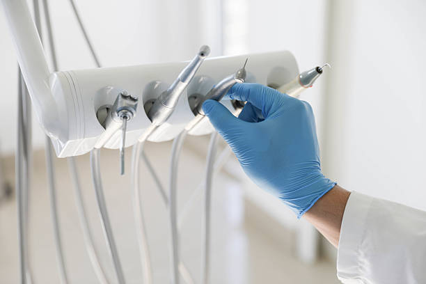 Professional Emergency Dentist technician working in Surfside, FL